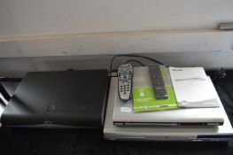 Philips and Technika DVD Players, and a Sky HD Box