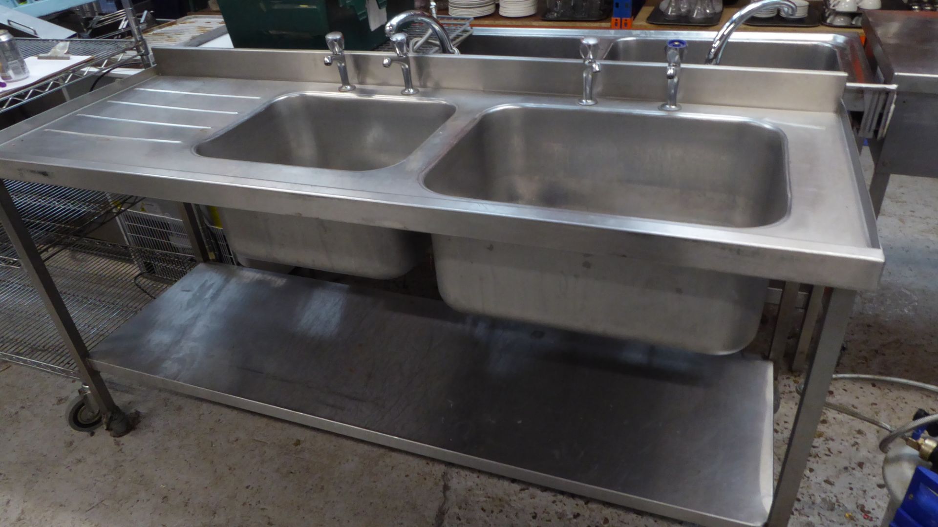 * S/S double sink with left hand drainer - complete with under shelf and taps. 1800w x 660d x 900h - Image 2 of 2