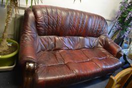 Dark Red Leather Sofa on Oak Base