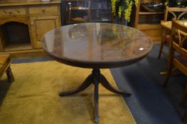 Glass Topped Mahogany Effect Circular Dining Table