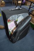 Antler Softshell Suitcase Containing Books