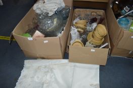 Two Boxes of Pottery, Glassware, Tablecloths, etc.