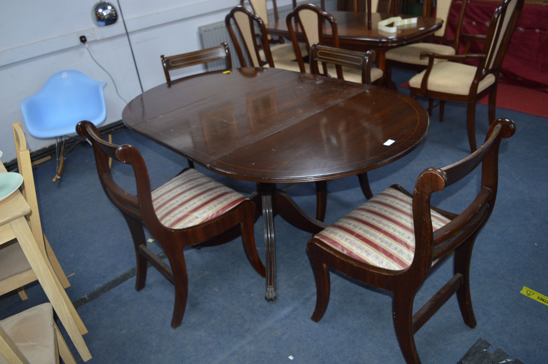 Oval Extending Dining Table with Four Chairs