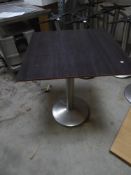 * 3 x square tables with pedestal tables with black wood effect tops. 650w x 650d x 730h