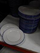 * approx 40 x white small plates with blue rim