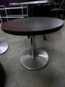 * 2 x low tables with chrome basis and wooden tops. 600 diameter x 550h