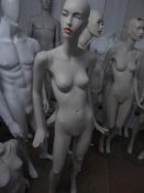 * white female mannequin - attractive features - glass stand