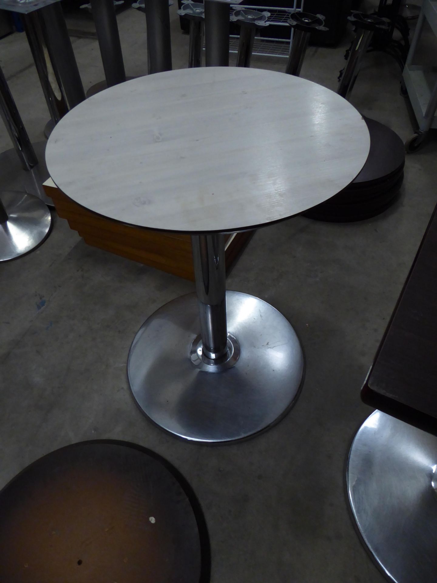 * 3 x tables with chrome bases - 2 x round (white wood effect top - 600d), 1 x square (dark work top - Image 3 of 3