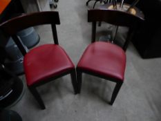 * 8 x wooden chairs with faux red leater upholstered seats