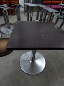 * 6 x square tables with chrome bases and dark wooden tops. 650w x 650d x 750h