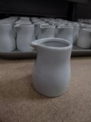 * 60+ x small white milk jugs