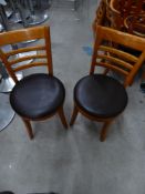 * 8 x wooden chairs with brown leather seats