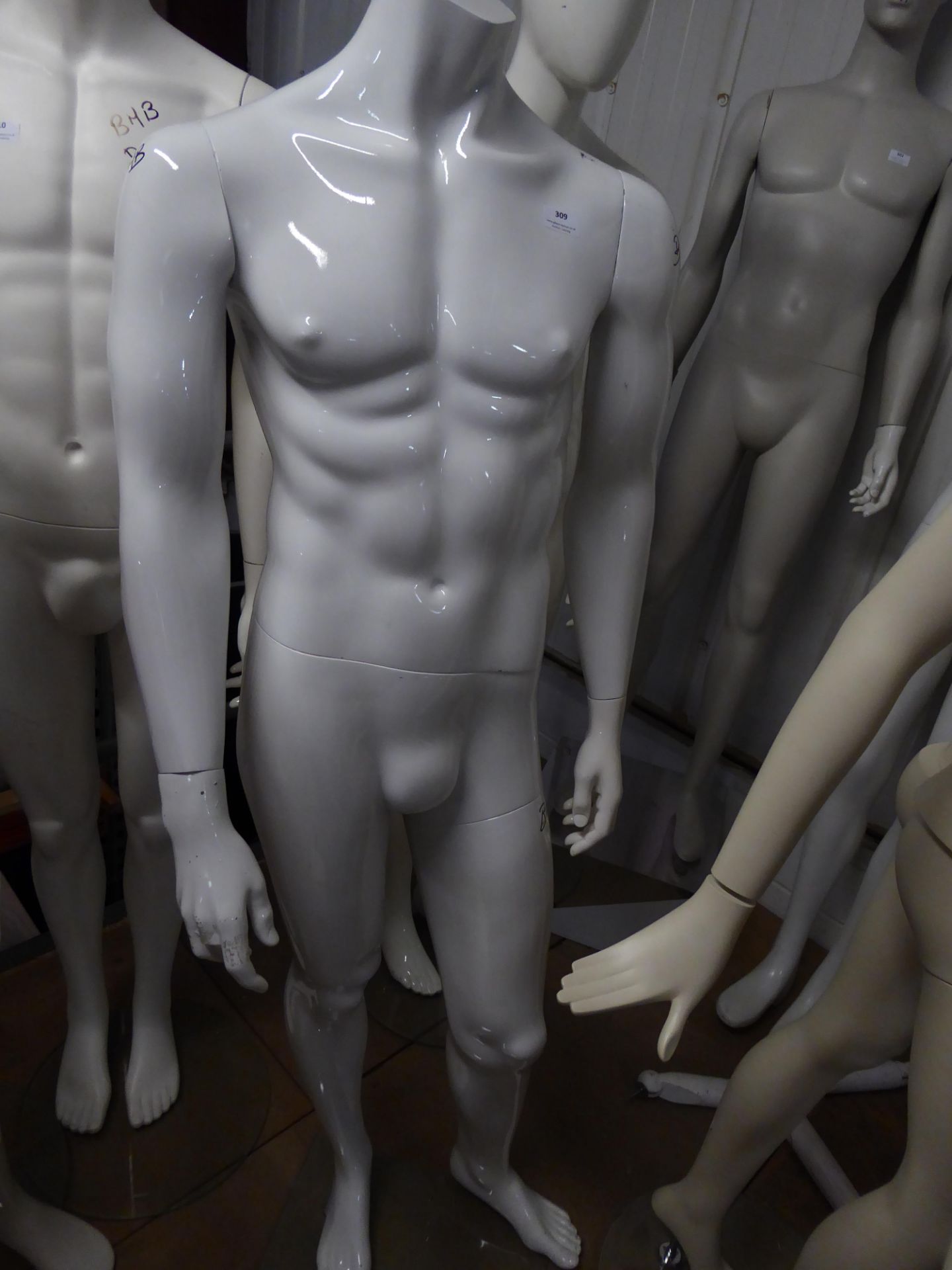 * white male mannequin - no head - glass stand