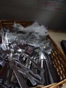 * wicker basket with large selection of cutlery - some new/wrapped. Knives/forks, spoons. Over 200