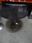 * 4 x round tables with pedestal bases and black wood effect tops. 800 diameter x 730h