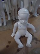 * small seated childs mannequin