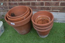 Eight Terracotta Plant Pots