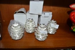Four Fir Cone Candle Holders