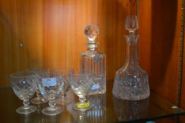 Two Cut Glass Decanters and Five Wine Glasses