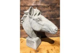 * Very large Stone ornate horses head on a plinth
