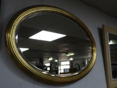 Oval Gilt Framed Beveled Edge Wall Mirror
