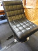 Black Swivel Chair on Chrome Base