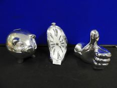 Two Metallic Money Boxes and a Dali Clock