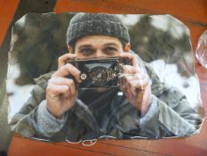 *Canvas Banner of a Man with a Camera