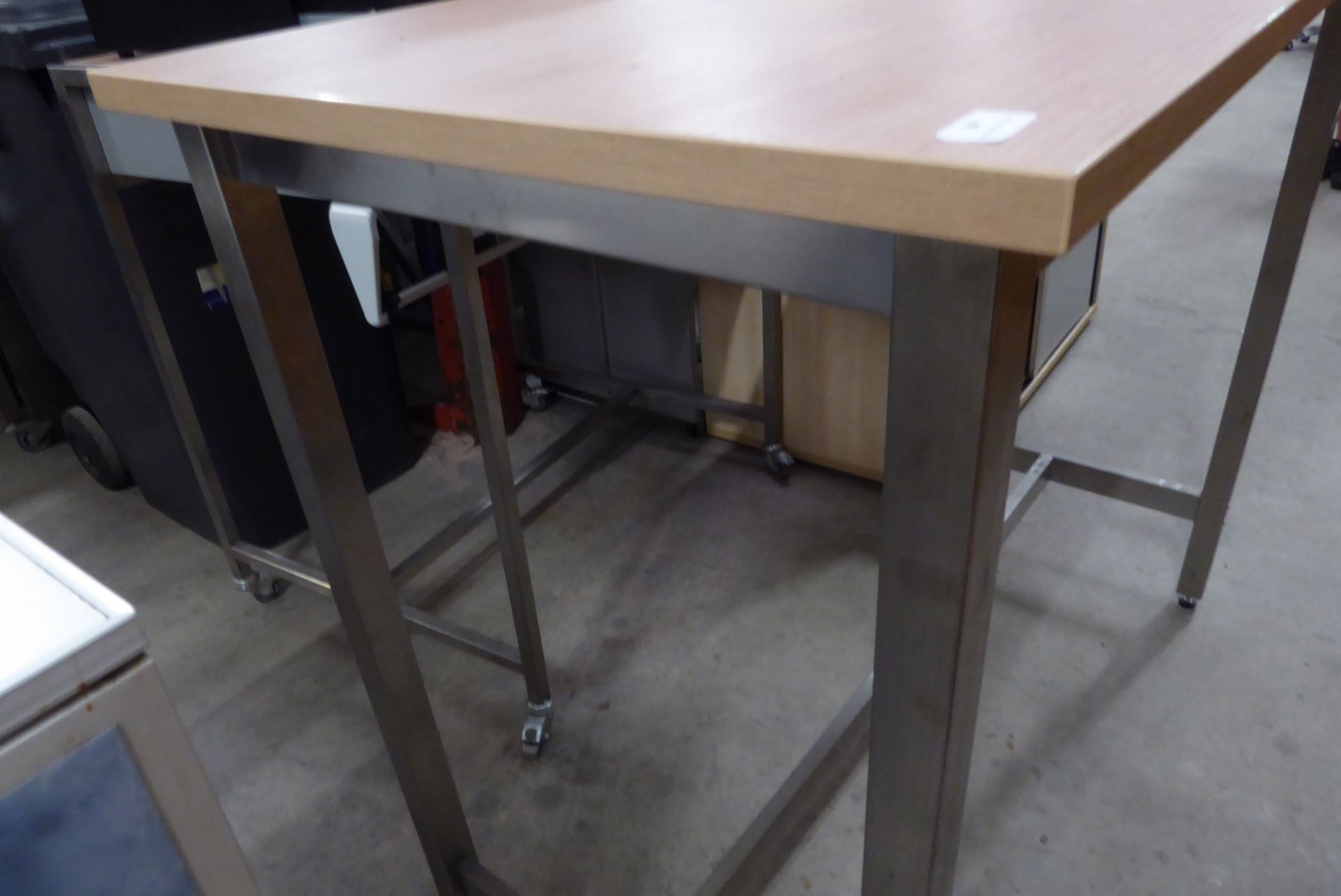 * high level shop display table, stainless steel finished legs with a pleasant wood effect top. - Image 2 of 3