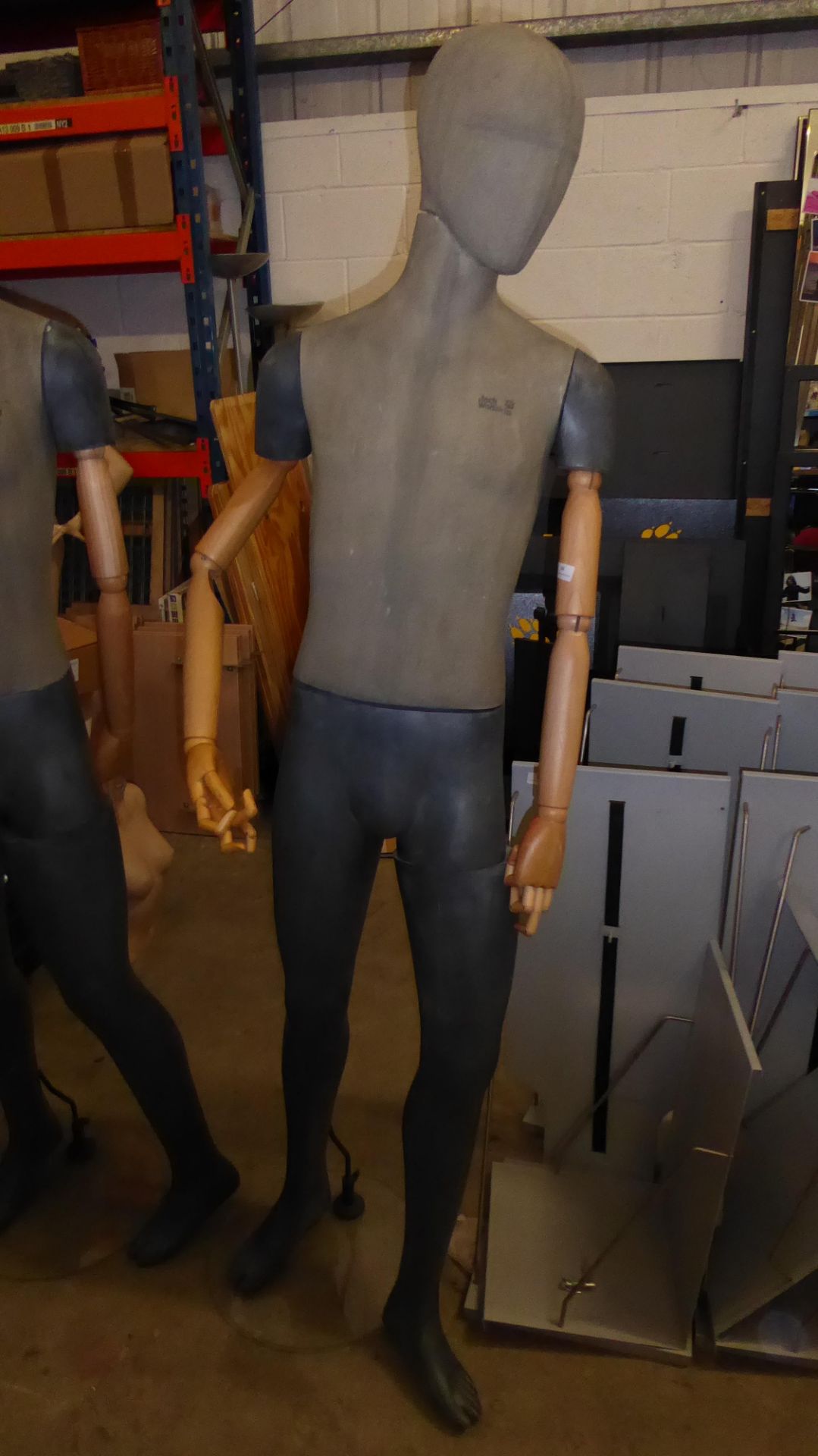 * Tall male mannequin, with wooden articulated arms and stand.