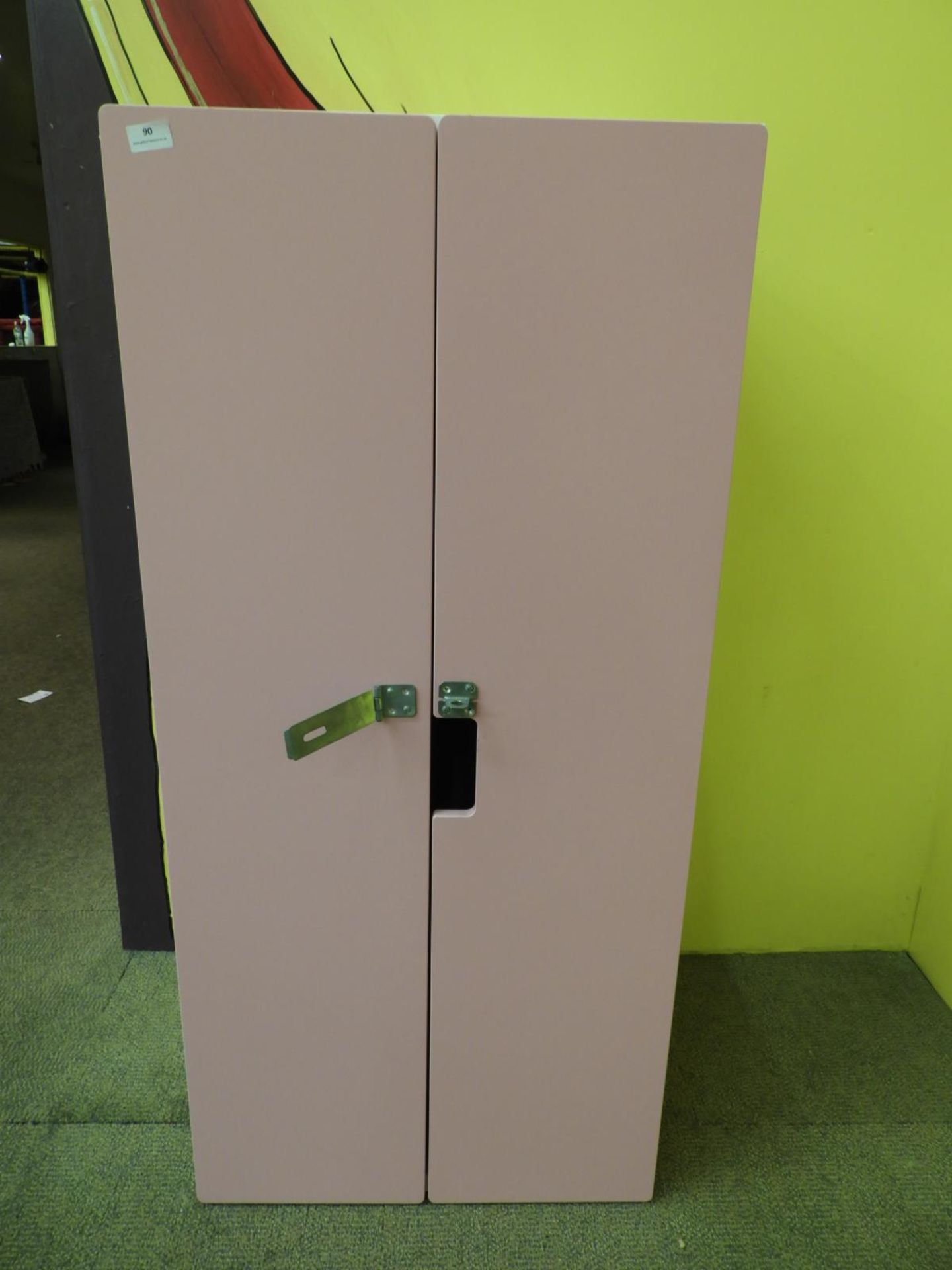 *Lockable Double Door Cabinet Enclosed by Pink Doors