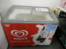 *Ice Cream Freezer with Sliding Lid Containing Assorted Doughnuts, Bread, etc.