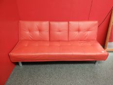 *Three Seat Sofa on Tubular Legs with Orange Vinyl Cover