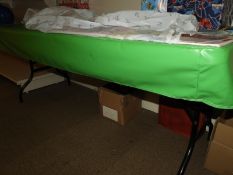 *6ft Table with Folding Legs and Green Vinyl Cover