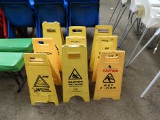 *Nine Caution Wet Floor Signs