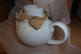 * 6 small white teapots