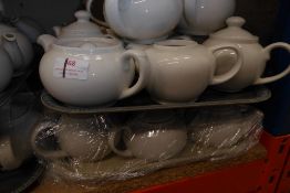 * Approx. 25 medium sized teapots with lids