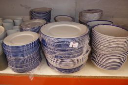 * Large quantity of blue rimmed white crockery: plates, sideplates and bowls approx. 250 pieces