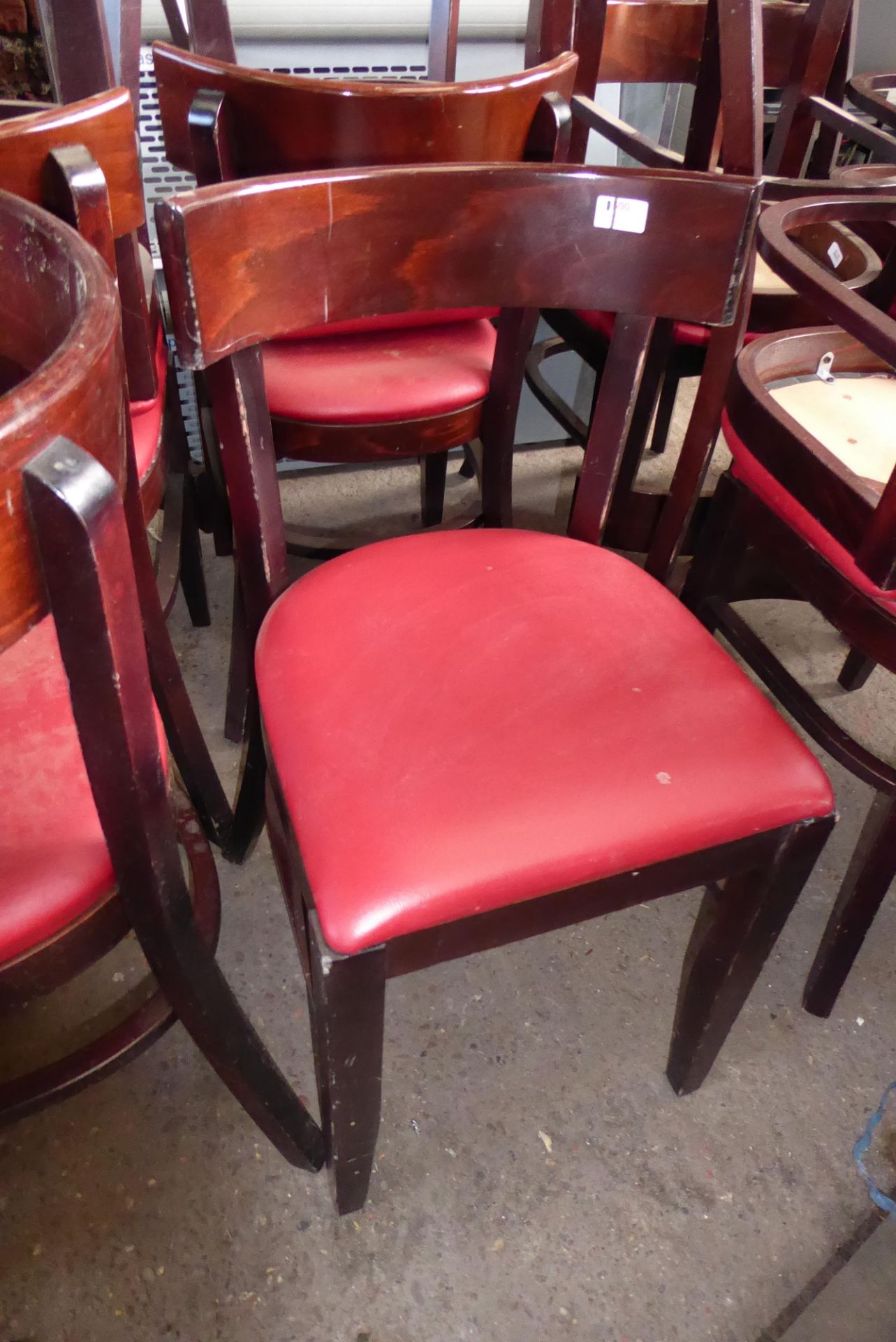 * 15 red vinyl padded dining chairs