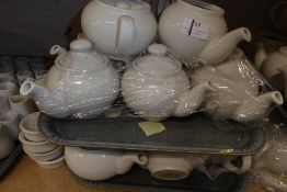 * 20+ meduim sized teapots with lids