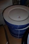 * Approx. 40 white dinner plates with blue rim 250 diameter