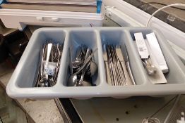 * Cutlery tray containing large quantity of cutlery