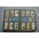 Cigarette Card Album and Contents