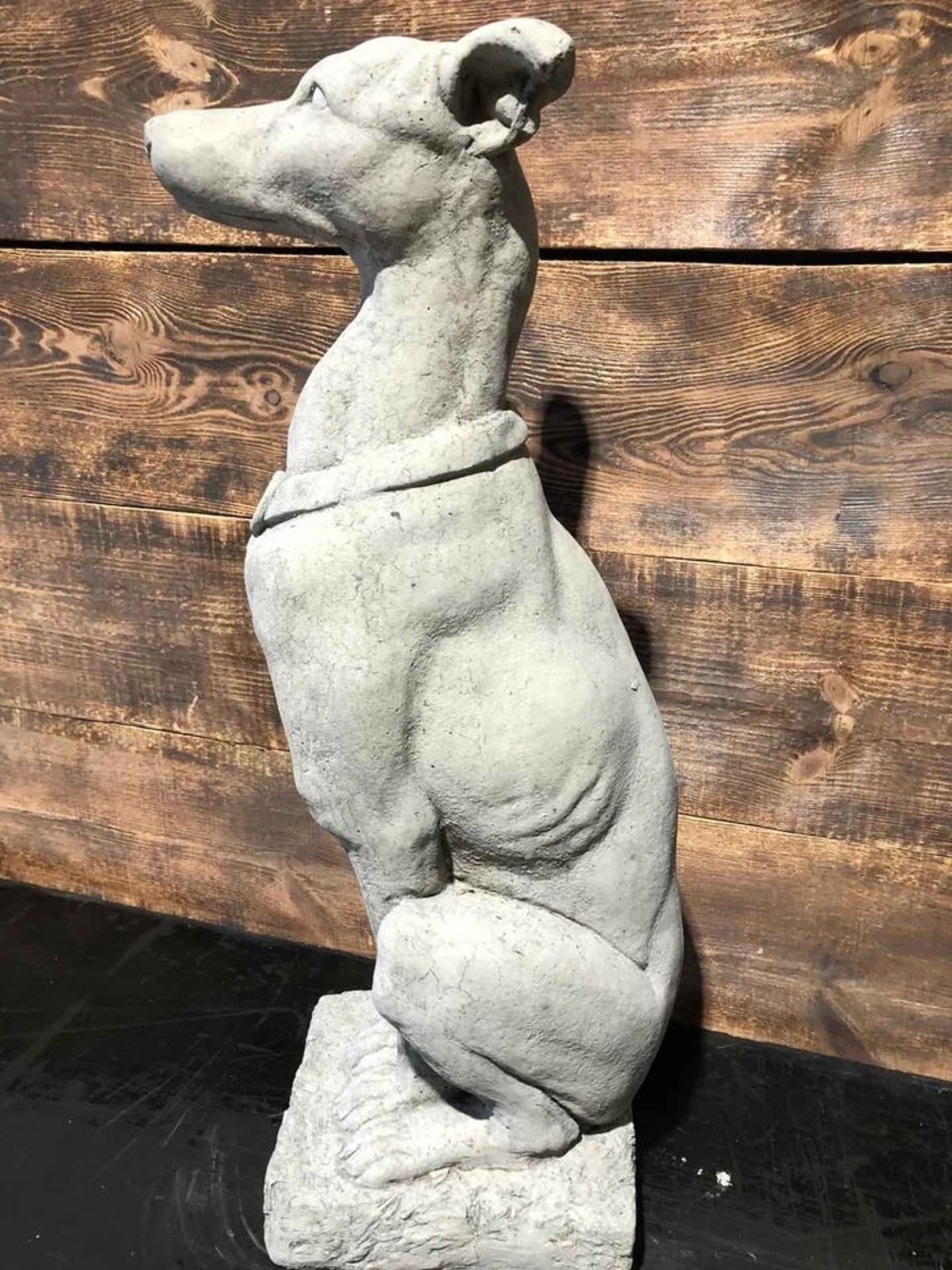 * Large Stone Greyhound sitting on a plinth