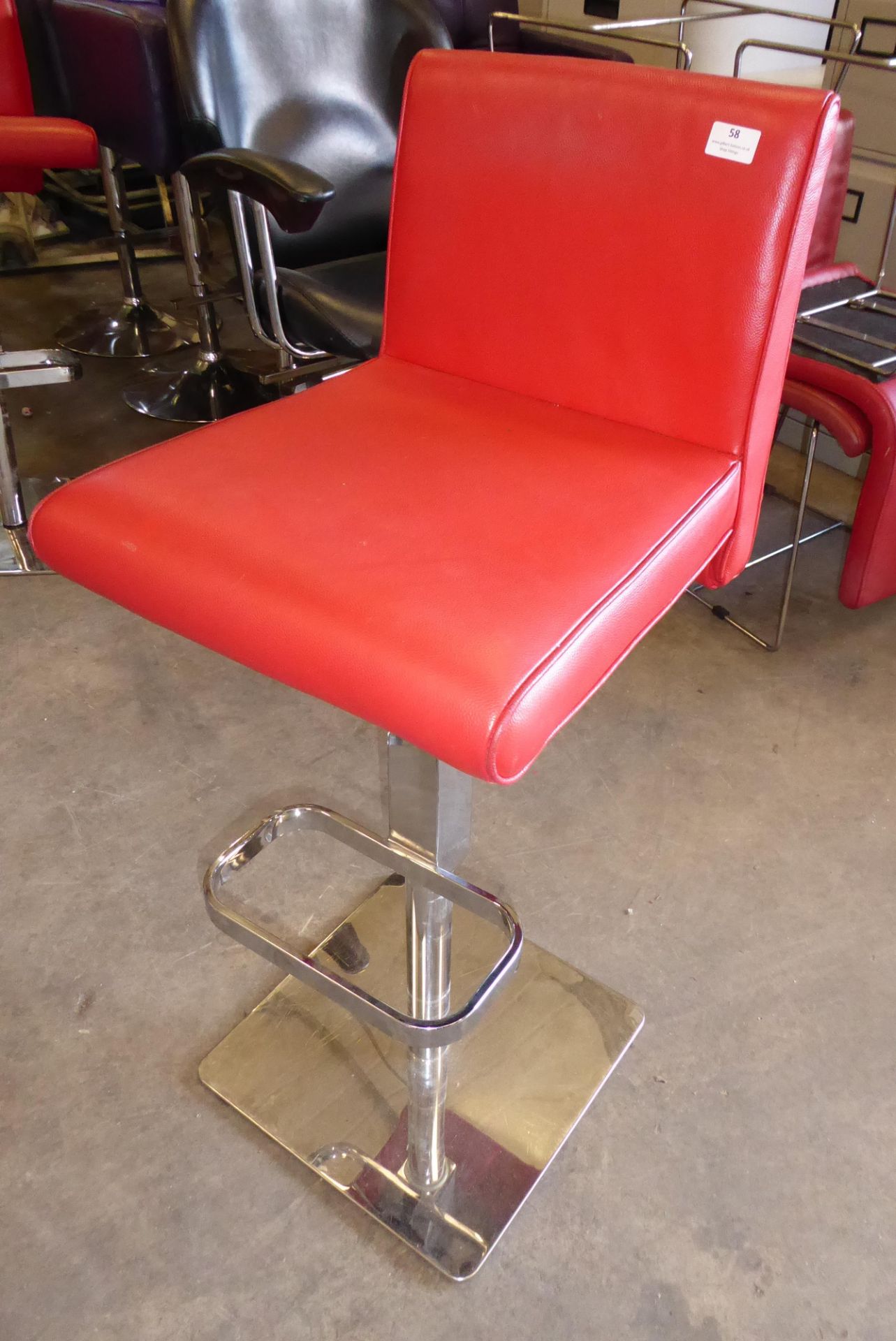 * Red adjustable gas strut chrome base Elizabeth Arden branded chair
