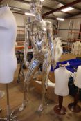 * chrome female mannequin on stand