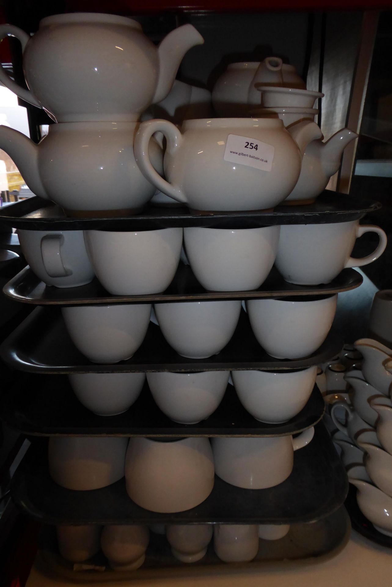 * approx. 40 x salt and pepper pots and 48 x tea cups and 10x tea pots