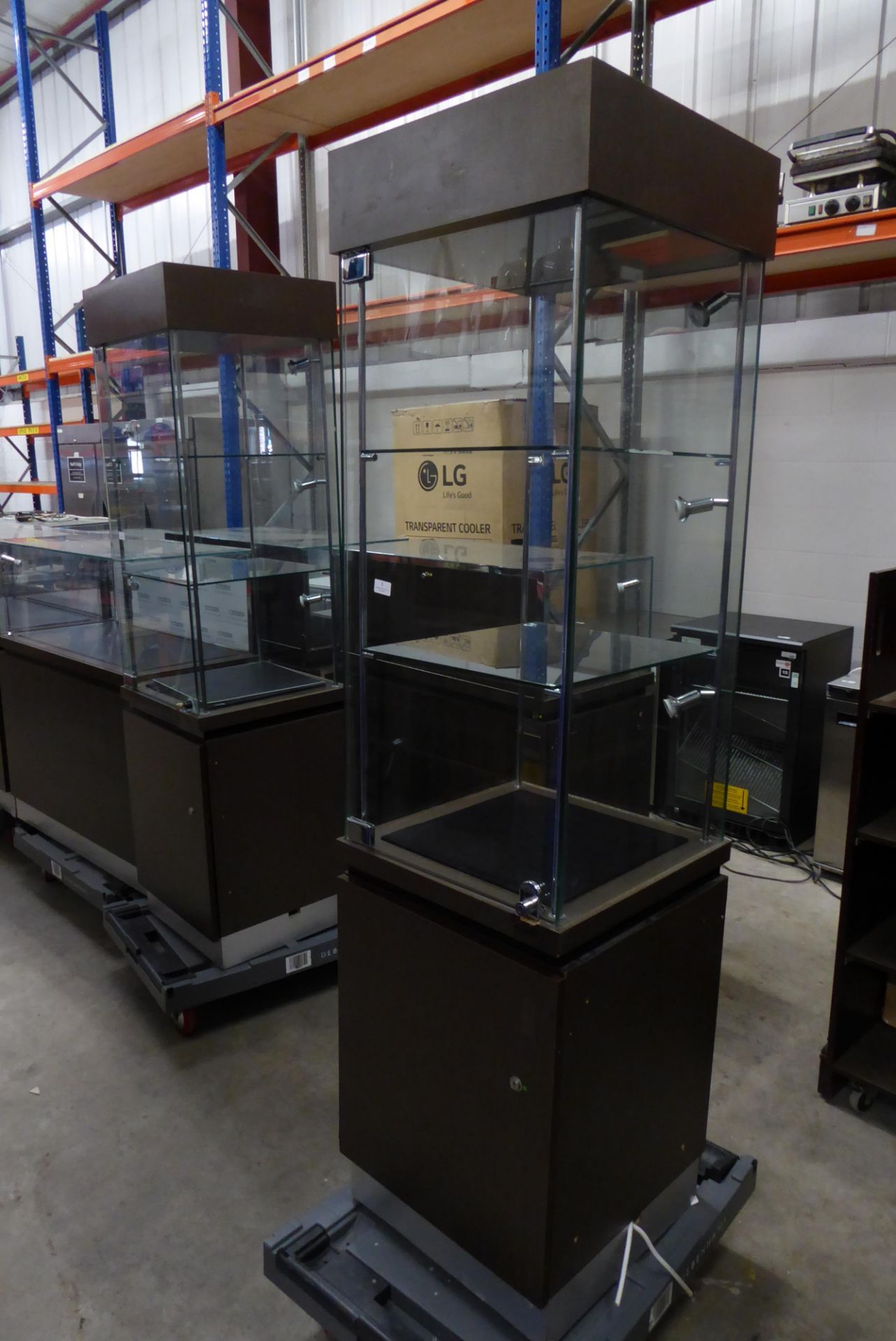 * Tall illuminated glass display cabinet 500 x 500 x 1900 locking with storage beneath and led