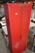 * small red school type cupboard. 600w x 320d x 1700h