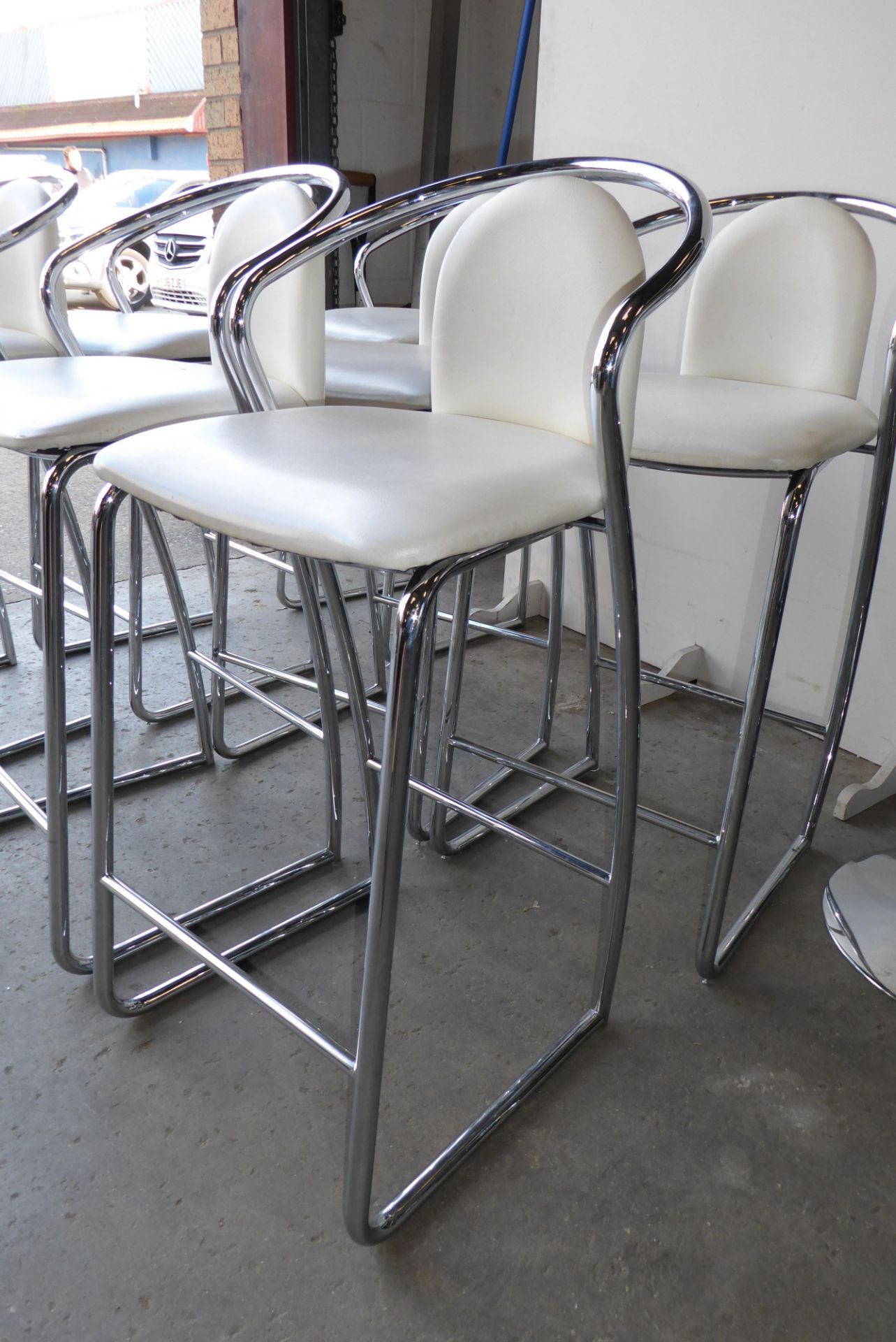 * Set of three high bar stools white leatherette with chrome frame